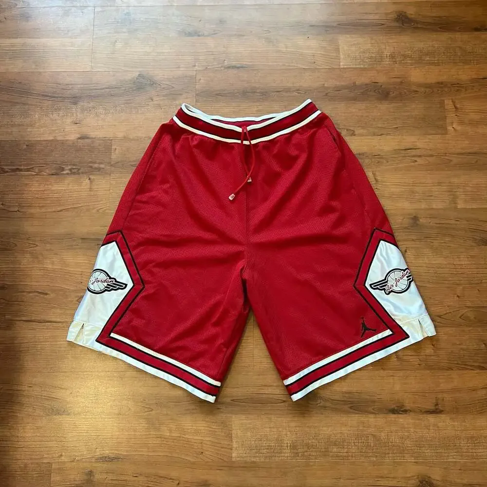 Vintage 80s/90s OG Air Jordan Wings Mesh Basketball Shorts Red & White Size L